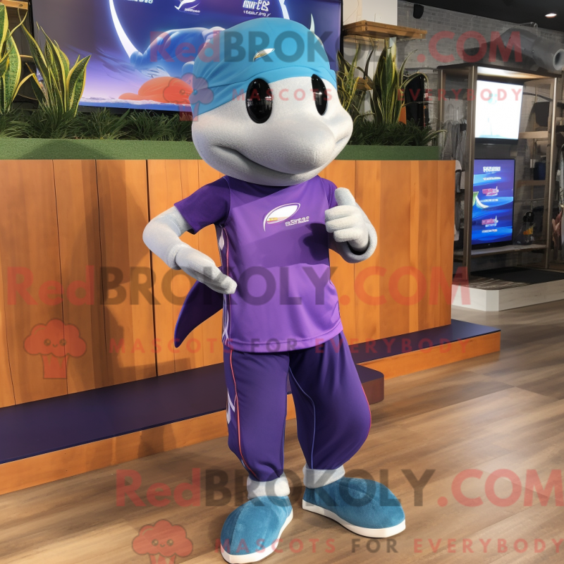 Mascot character of a Purple Dolphin dressed with a Running Shorts and Headbands Mascot character of a Purple Dolphin dressed with a Running Shorts and Headbands