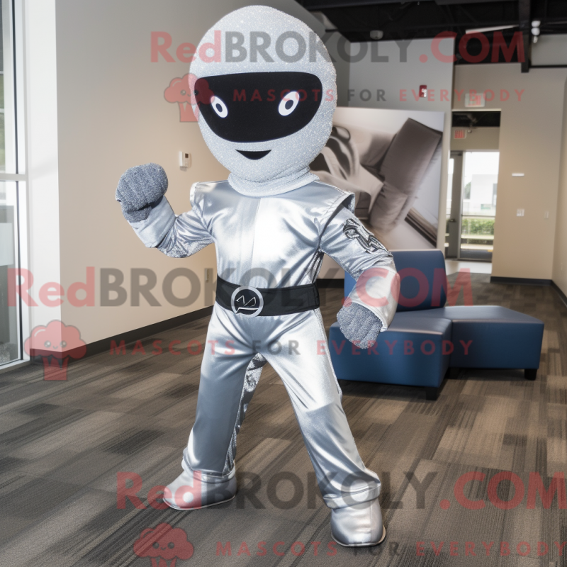 Mascot character of a Silver Ninja dressed with a Flare Jeans and Ties Mascot character of a Silver Ninja dressed with a Flare Jeans and Ties