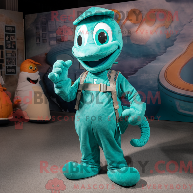 Mascot character of a Teal Hydra dressed with a Overalls and Wraps Mascot character of a Teal Hydra dressed with a Overalls and Wraps