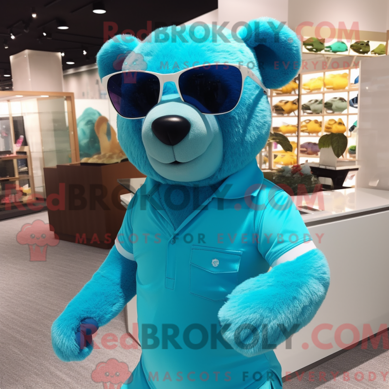 Mascot character of a Cyan Bear dressed with a Polo Tee and Sunglasses Mascot character of a Cyan Bear dressed with a Polo Tee and Sunglasses