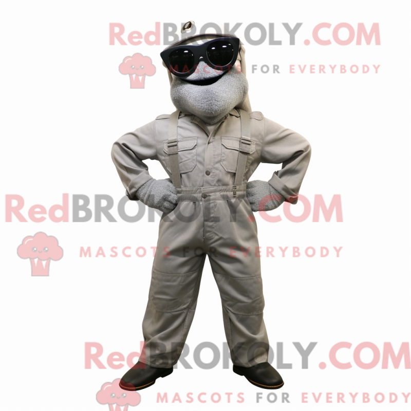 Mascot character of a Silver Marine Recon dressed with a Dungarees and Sunglasses Mascot character of a Silver Marine Recon dressed with a Dungarees and Sunglasses