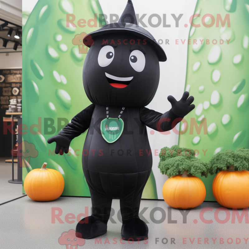 Mascot character of a Black Melon dressed with a Jumpsuit and Beanies Mascot character of a Black Melon dressed with a Jumpsuit and Beanies
