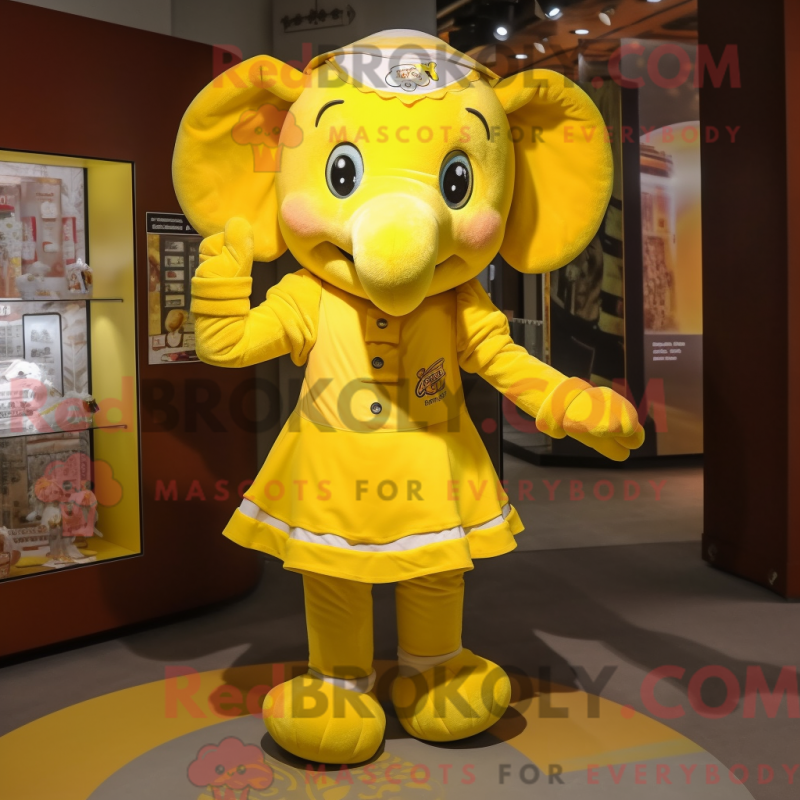 Mascot character of a Yellow Elephant dressed with a Mini Skirt and Headbands Mascot character of a Yellow Elephant dressed with a Mini Skirt and Headbands