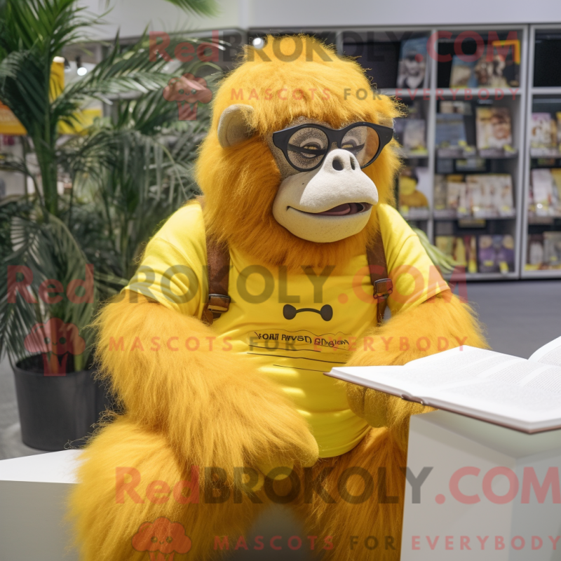 Mascot character of a Yellow Orangutan dressed with a Romper and Reading glasses Mascot character of a Yellow Orangutan dressed with a Romper and Reading glasses
