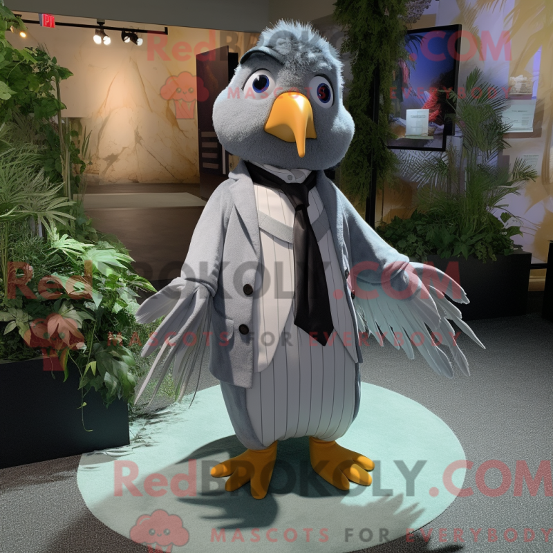 Mascot character of a Gray Dove dressed with a Cover-up and Bow ties Mascot character of a Gray Dove dressed with a Cover-up and Bow ties