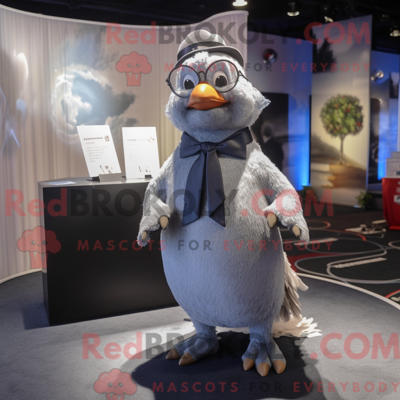 Mascot character of a Gray Dove dressed with a Cover-up and Bow ties Mascot character of a Gray Dove dressed with a Cover-up and Bow ties