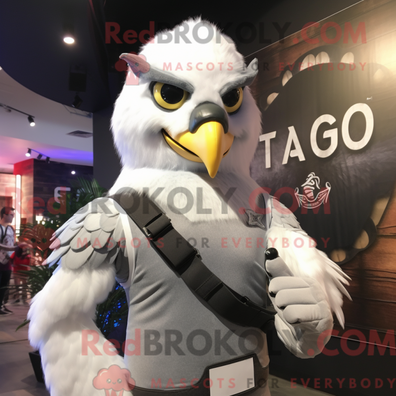 Mascot character of a Silver Falcon dressed with a Tank Top and Headbands Mascot character of a Silver Falcon dressed with a Tank Top and Headbands