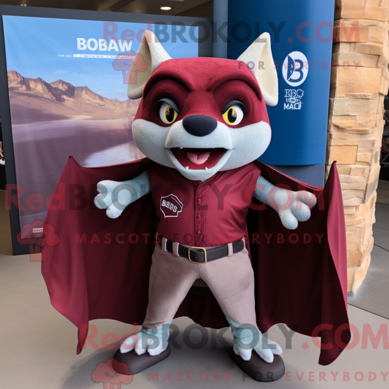 Mascot character of a Maroon Bat dressed with a Flare Jeans and Wraps Mascot character of a Maroon Bat dressed with a Flare Jeans and Wraps