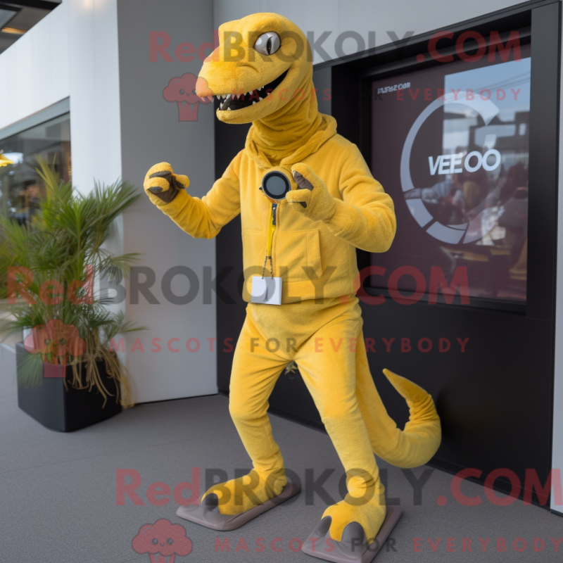 Mascot character of a Lemon Yellow Velociraptor dressed with a Corduroy Pants and Digital watches Mascot character of a Lemon Yellow Velociraptor dressed with a Corduroy Pants and Digital watches