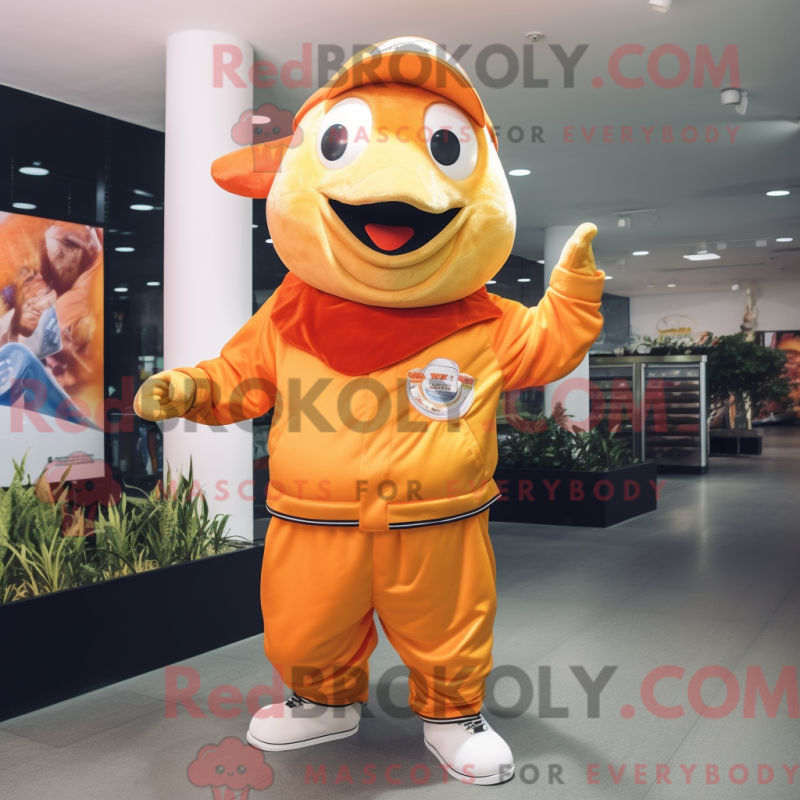 Mascot character of a Gold Clown Fish dressed with a Long Sleeve Tee and Caps Mascot character of a Gold Clown Fish dressed with a Long Sleeve Tee and Caps
