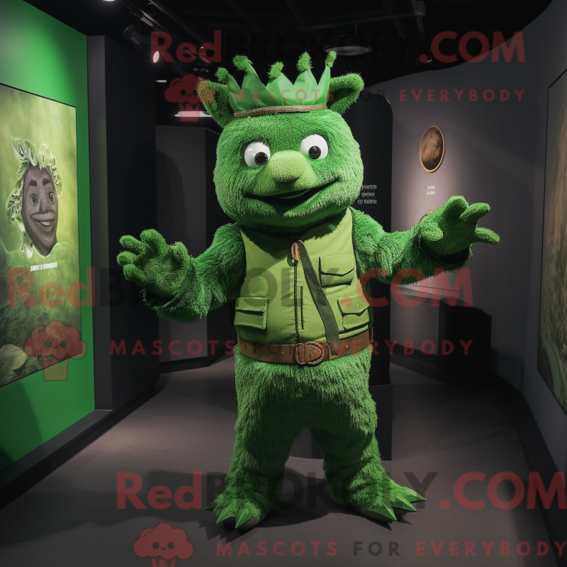 Mascot character of a Green Chief dressed with a Romper and Cummerbunds Mascot character of a Green Chief dressed with a Romper and Cummerbunds