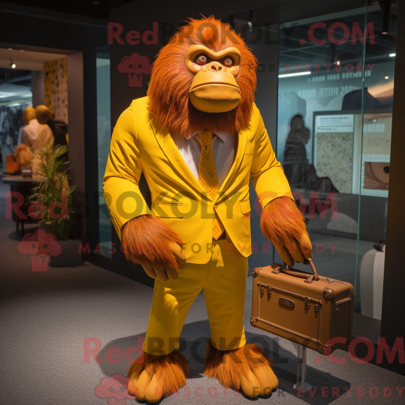 Mascot character of a Yellow Orangutan dressed with a Suit Jacket and Clutch bags Mascot character of a Yellow Orangutan dressed with a Suit Jacket and Clutch bags