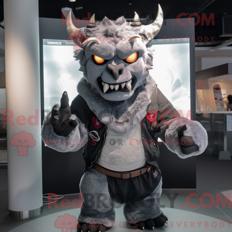 Mascot character of a Gray Demon dressed with a Leather Jacket and Scarves Mascot character of a Gray Demon dressed with a Leather Jacket and Scarves