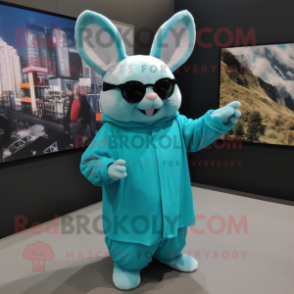 Turquoise Chinchilla mascot costume character dressed with a Long Sleeve Tee and Eyeglasses