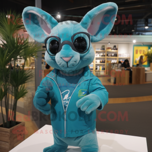 Turquoise Chinchilla mascot costume character dressed with a Long Sleeve Tee and Eyeglasses