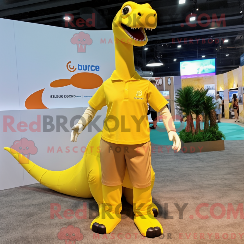 Mascot character of a Yellow Brachiosaurus dressed with a Polo Tee and Suspenders Mascot character of a Yellow Brachiosaurus dressed with a Polo Tee and Suspenders