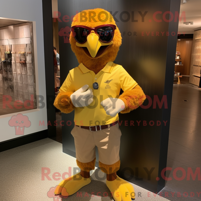 Mascot character of a Gold Eagle dressed with a Playsuit and Bracelet watches Mascot character of a Gold Eagle dressed with a Playsuit and Bracelet watches
