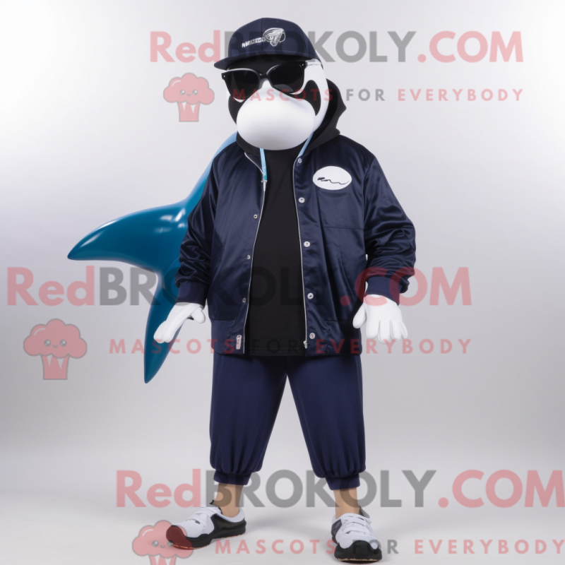 Mascot character of a Navy Killer Whale dressed with a Bermuda Shorts and Eyeglasses Mascot character of a Navy Killer Whale dressed with a Bermuda Shorts and Eyeglasses