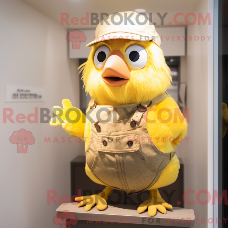 Mascot character of a Tan Canary dressed with a Dungarees and Mittens Mascot character of a Tan Canary dressed with a Dungarees and Mittens