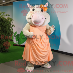 Mascot character of a Peach Rhinoceros dressed with a Maxi Skirt and Foot pads