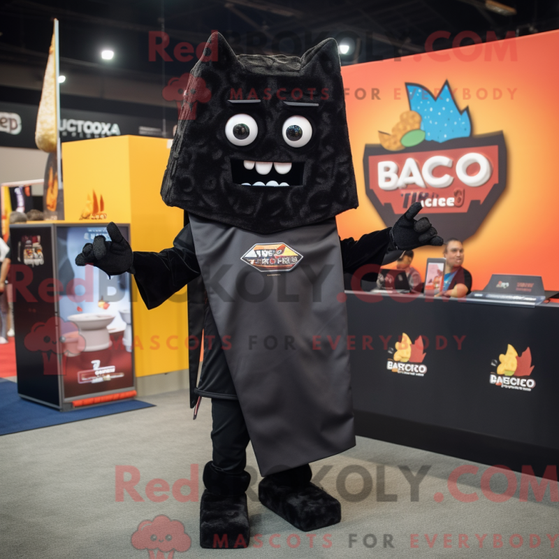 Mascot character of a Black Nachos dressed with a Shift Dress and Briefcases Mascot character of a Black Nachos dressed with a Shift Dress and Briefcases