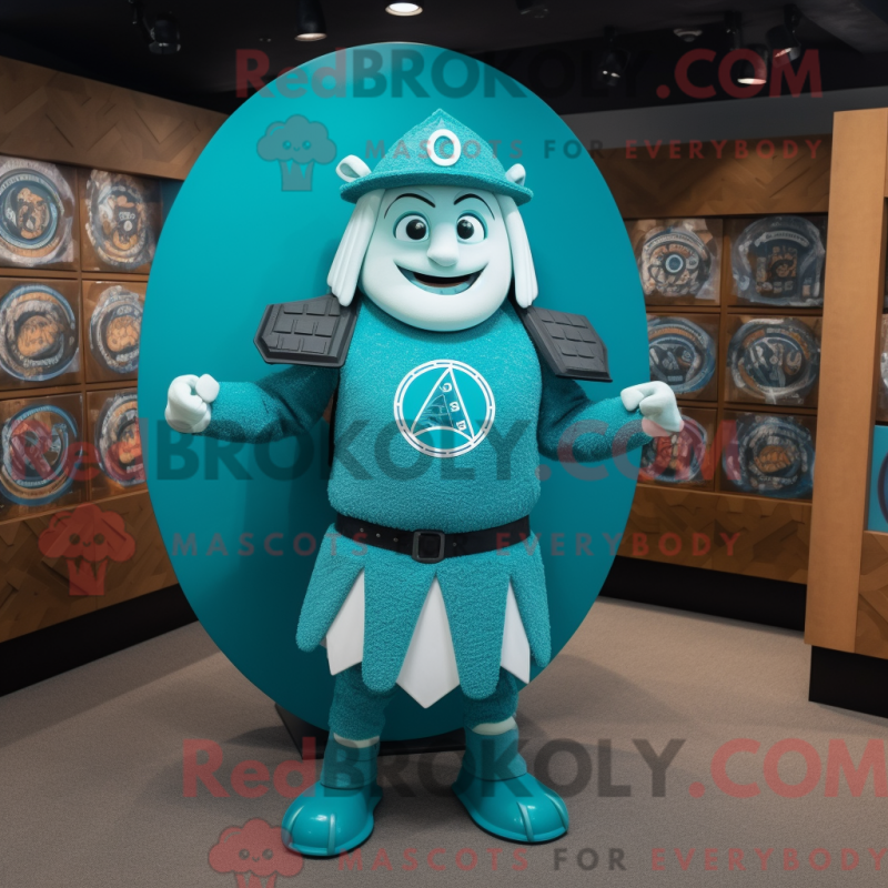 Mascot character of a Turquoise Celtic Shield dressed with a Henley Tee and Caps Mascot character of a Turquoise Celtic Shield dressed with a Henley Tee and Caps