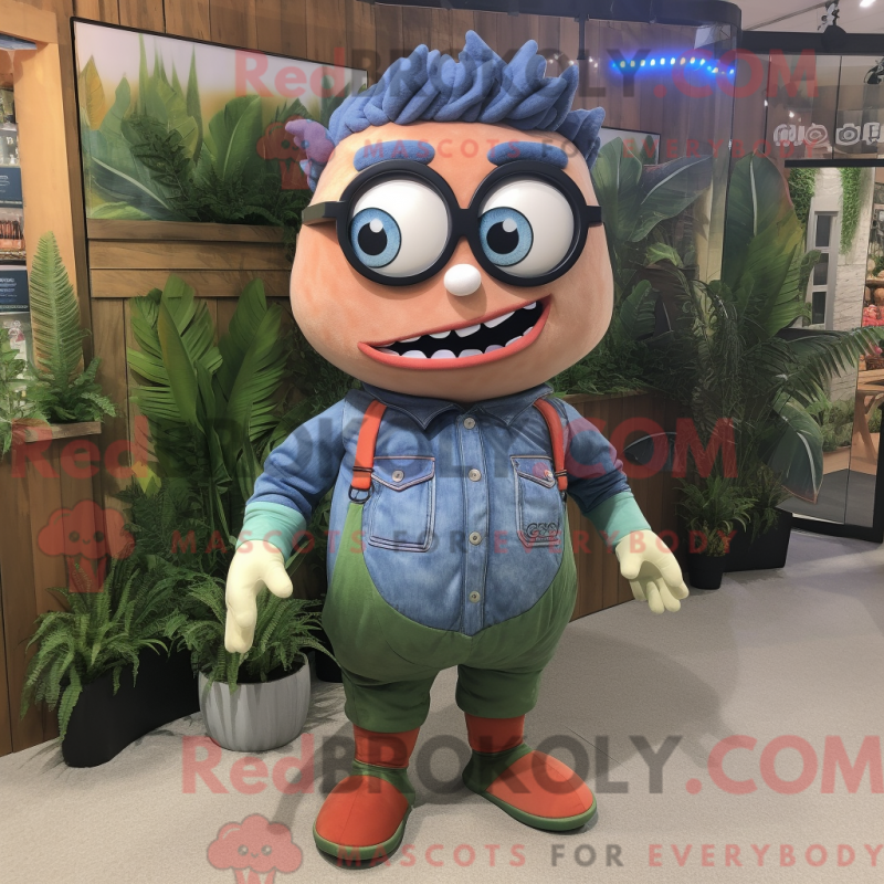 Mascot character of a Olive Salmon dressed with a Denim Shirt and Eyeglasses Mascot character of a Olive Salmon dressed with a Denim Shirt and Eyeglasses