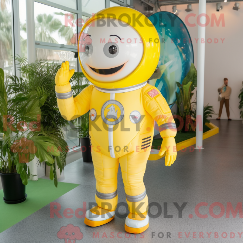 Mascot character of a Lemon Yellow Astronaut dressed with a Suit Jacket and Tie pins Mascot character of a Lemon Yellow Astronaut dressed with a Suit Jacket and Tie pins