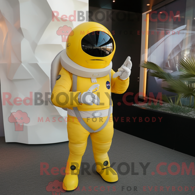 Mascot character of a Lemon Yellow Astronaut dressed with a Suit Jacket and Tie pins Mascot character of a Lemon Yellow Astronaut dressed with a Suit Jacket and Tie pins