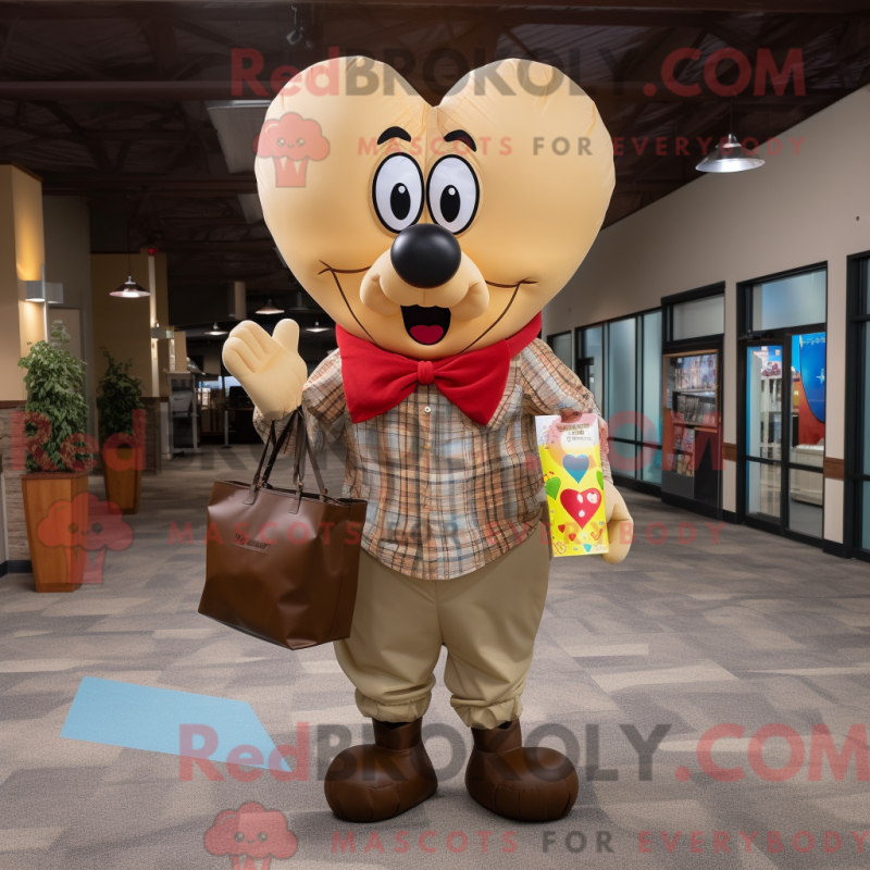 Mascot character of a Tan Heart Shaped Balloons dressed with a Flannel Shirt and Tote bags Mascot character of a Tan Heart Shaped Balloons dressed with a Flannel Shirt and Tote bags