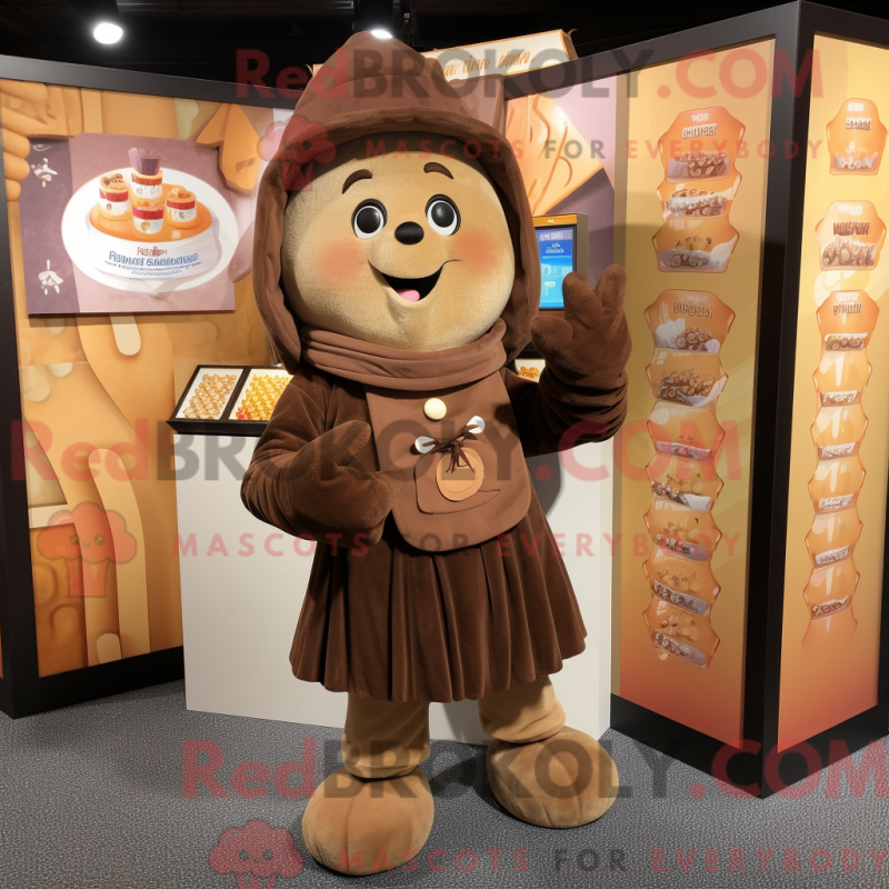 Mascot character of a Tan Chocolates dressed with a Corduroy Pants and Shawls Mascot character of a Tan Chocolates dressed with a Corduroy Pants and Shawls