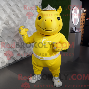 Mascot character of a Lemon Yellow Rhinoceros dressed with a Leggings and Smartwatches