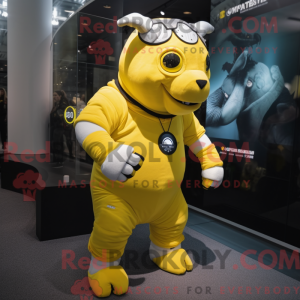 Mascot character of a Lemon Yellow Rhinoceros dressed with a Leggings and Smartwatches