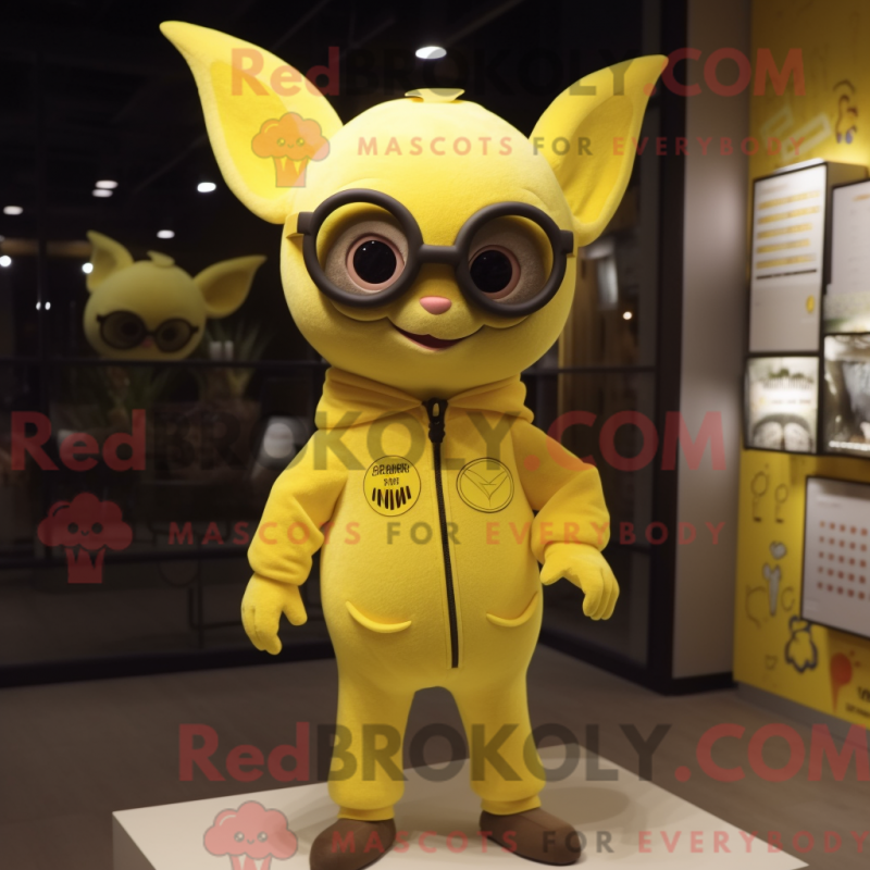 Mascot character of a Lemon Yellow Bat dressed with a Jumpsuit and Eyeglasses Mascot character of a Lemon Yellow Bat dressed with a Jumpsuit and Eyeglasses