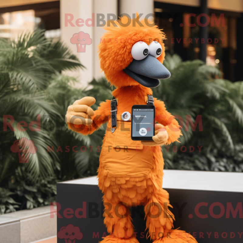 Mascot character of a Orange Ostrich dressed with a Overalls and Smartwatches Mascot character of a Orange Ostrich dressed with a Overalls and Smartwatches