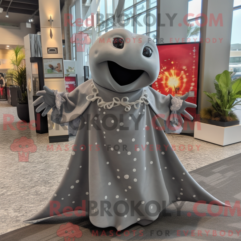Mascot character of a Gray Stingray dressed with a Maxi Dress and Tie pins Mascot character of a Gray Stingray dressed with a Maxi Dress and Tie pins