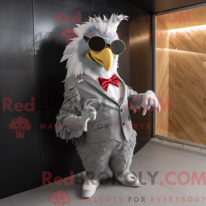 Mascot character of a Gray Rooster dressed with a Blazer and Sunglasses Mascot character of a Gray Rooster dressed with a Blazer and Sunglasses