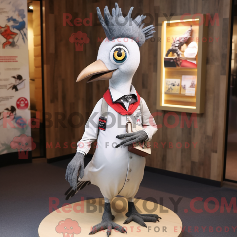 Mascot character of a Silver Woodpecker dressed with a Oxford Shirt and Hairpins Mascot character of a Silver Woodpecker dressed with a Oxford Shirt and Hairpins