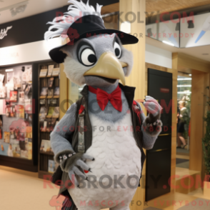 Mascot character of a Silver Woodpecker dressed with a Oxford Shirt and Hairpins