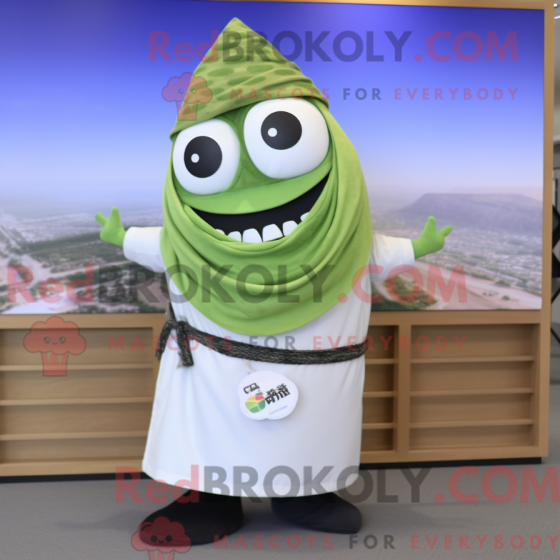 Mascot character of a Olive Sushi dressed with a Shorts and Shawls Mascot character of a Olive Sushi dressed with a Shorts and Shawls