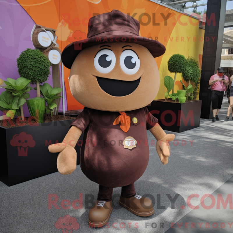Mascot character of a Brown Plum dressed with a Playsuit and Suspenders Mascot character of a Brown Plum dressed with a Playsuit and Suspenders