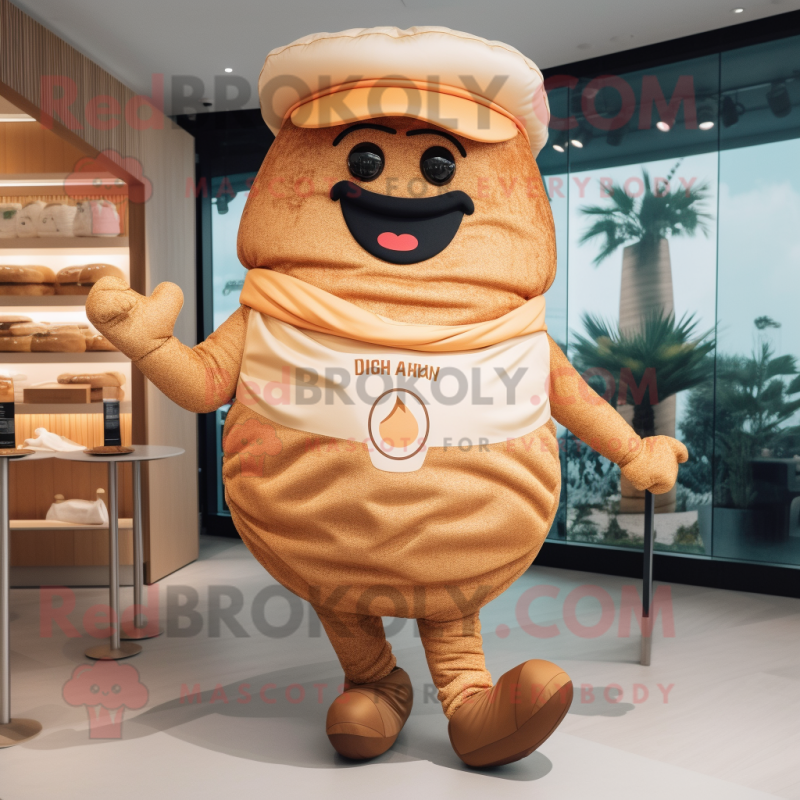 Tan Croissant mascot costume character dressed with a Swimwear and Shoe laces