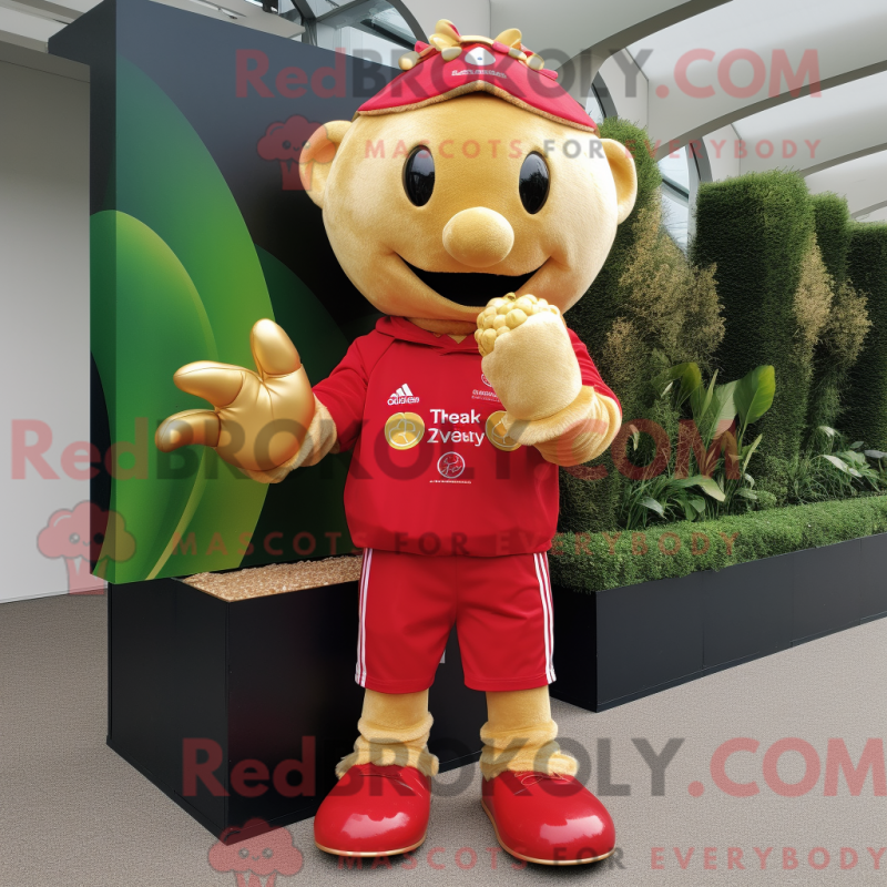 Mascot character of a Gold Strawberry dressed with a Rugby Shirt and Gloves Mascot character of a Gold Strawberry dressed with a Rugby Shirt and Gloves