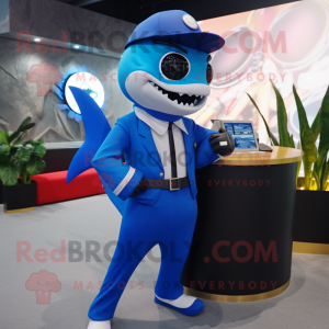 Blue Shark mascot costume character dressed with a Suit and Smartwatches