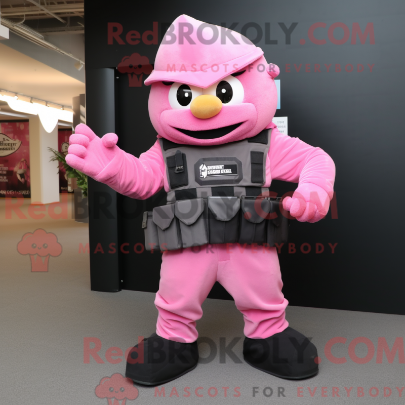Mascot character of a Pink Commando dressed with a Vest and Gloves Mascot character of a Pink Commando dressed with a Vest and Gloves