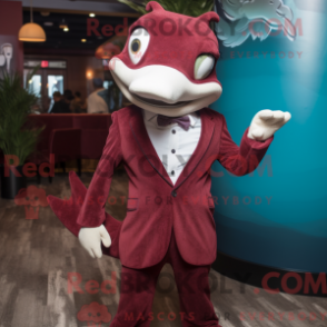 Mascot character of a Maroon Dolphin dressed with a Dress Shirt and Lapel pins