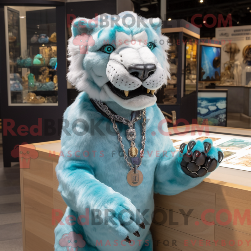 Mascot character of a Cyan Smilodon dressed with a Henley Shirt and Keychains Mascot character of a Cyan Smilodon dressed with a Henley Shirt and Keychains