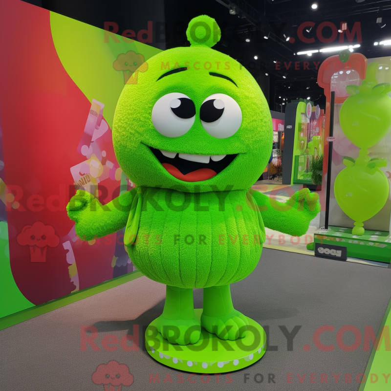 Mascot character of a Lime Green Candy dressed with a Mini Dress and Backpacks Mascot character of a Lime Green Candy dressed with a Mini Dress and Backpacks