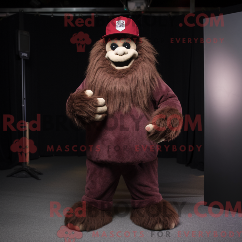 Mascot character of a Maroon Sasquatch dressed with a Trousers and Beanies Mascot character of a Maroon Sasquatch dressed with a Trousers and Beanies