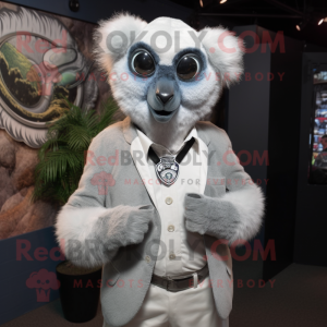 Silver Lemur mascot costume character dressed with a Blazer and Rings